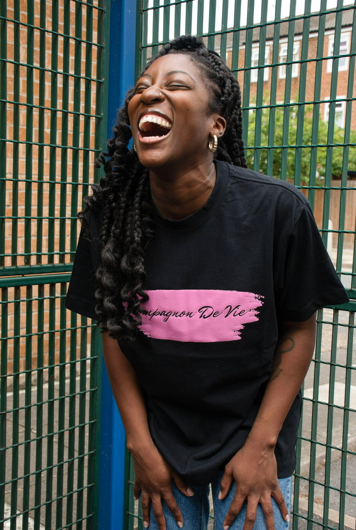 Black t-shirt with pink logo London streetwear - COMPAGNON DE VIE lifestyle shot